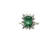 Ring with emerald and diamonds on a white background