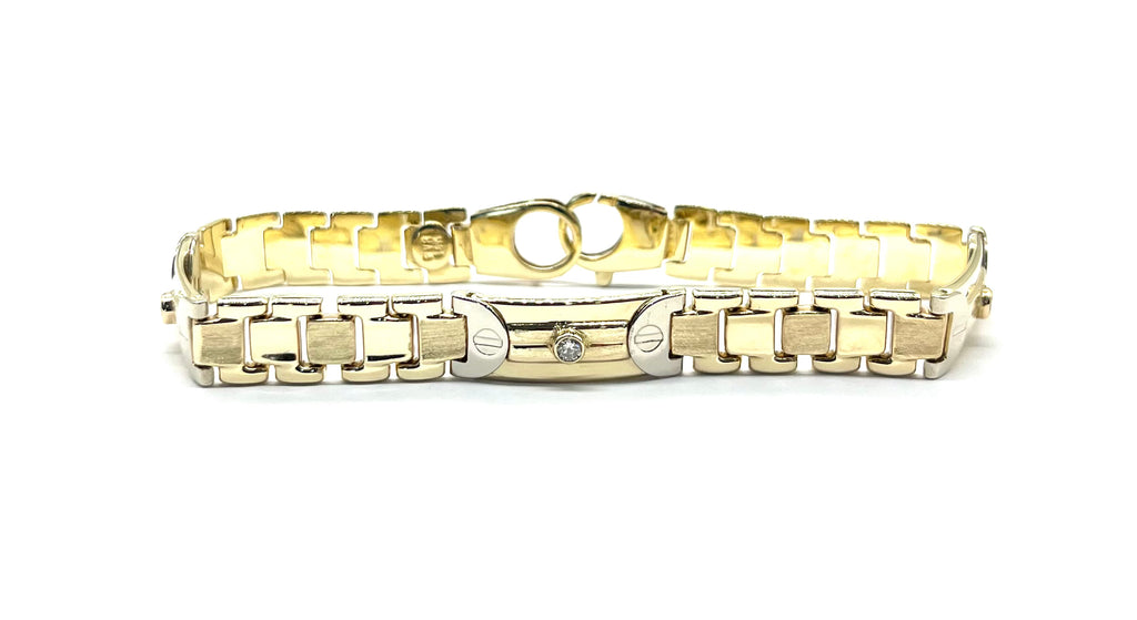Gold bracelet with a diamond on a white background