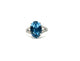 .925 Sterling Silver Oval Aqua CZ Open Shank Ring Ring with a blue gemstone on a white background
