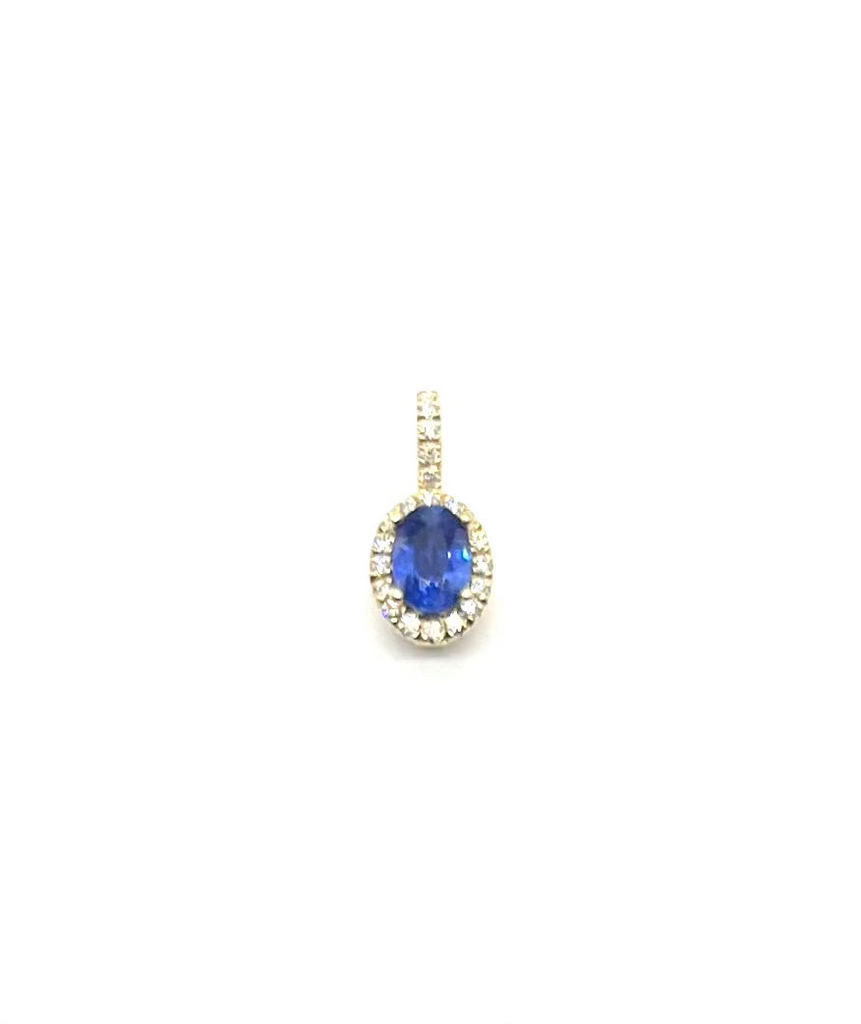 Gold pendant with a blue gemstone on a white background