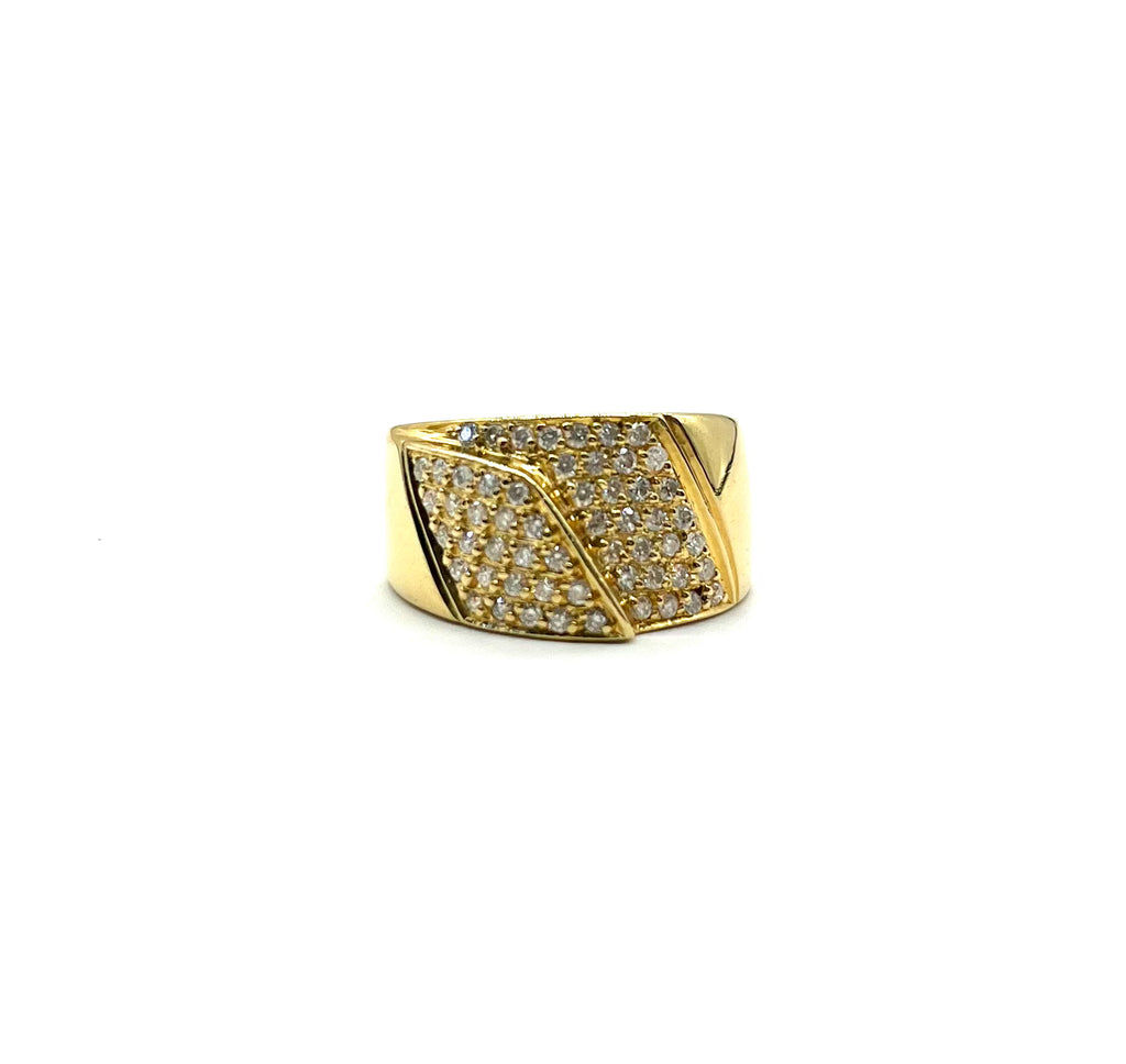 Gold ring with diamond accents on a white background