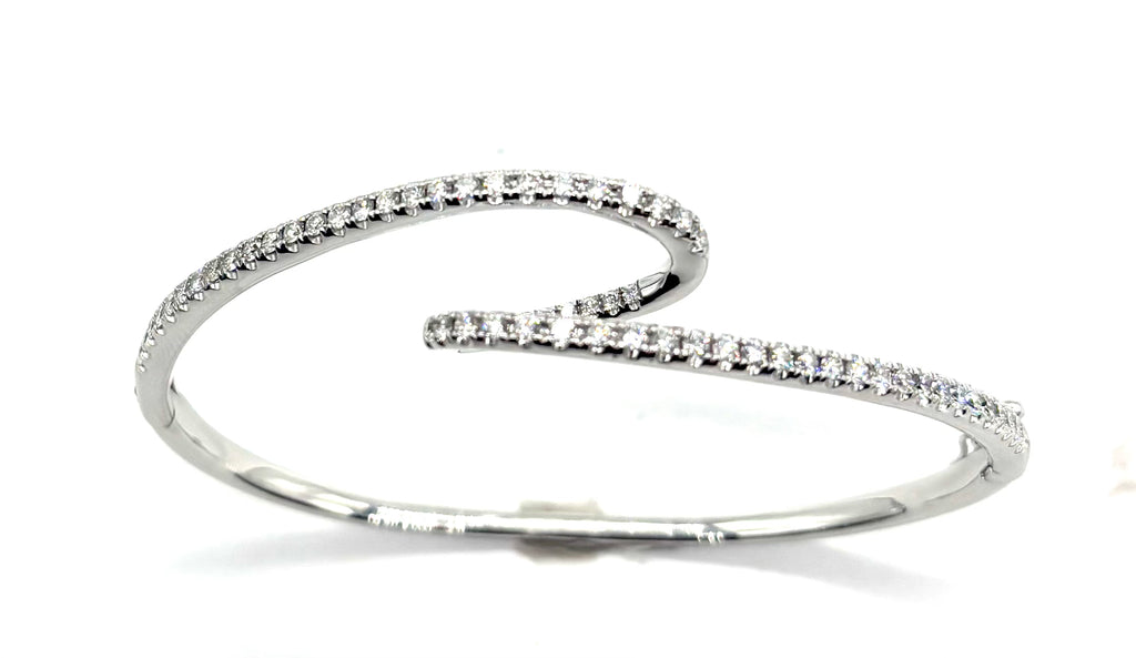 Silver bracelet with small stones on a white background