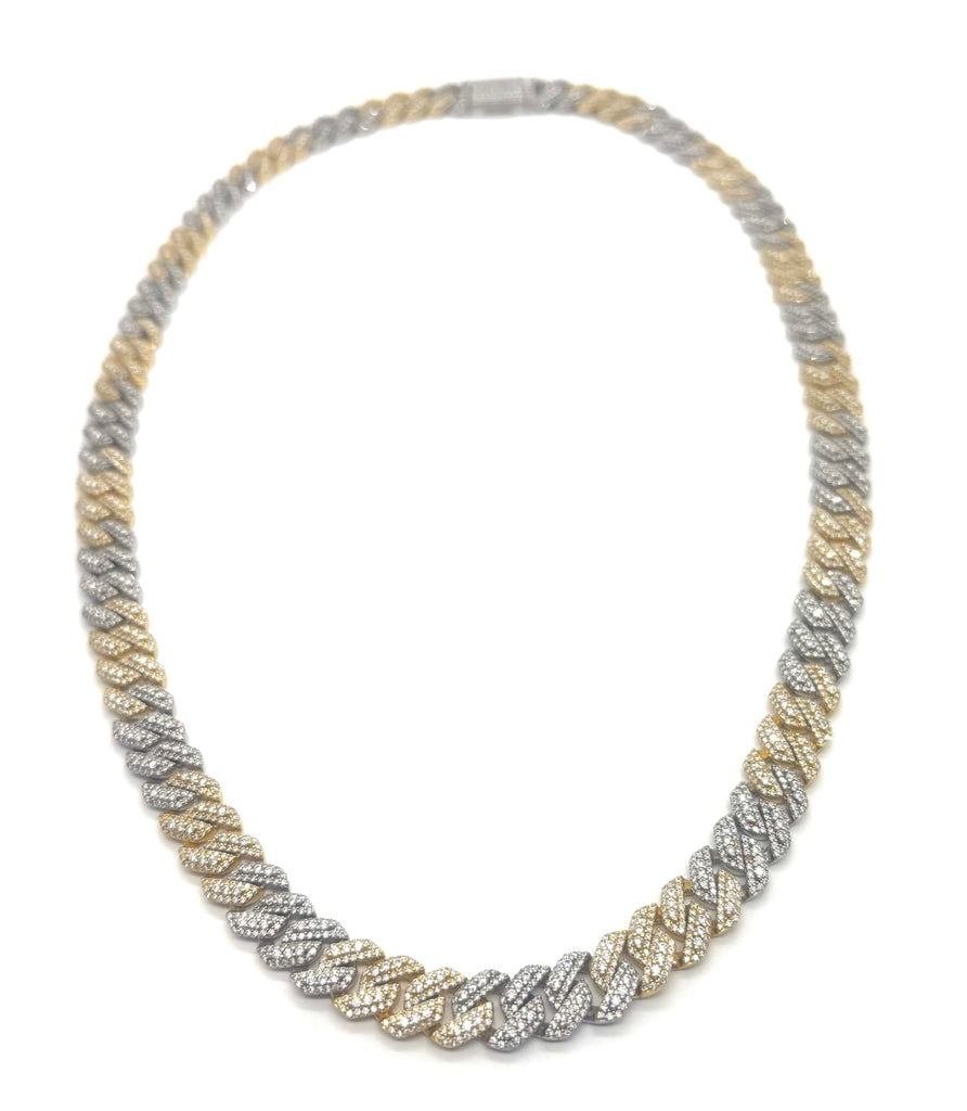 Necklace with interwoven gold and silver design on a white background