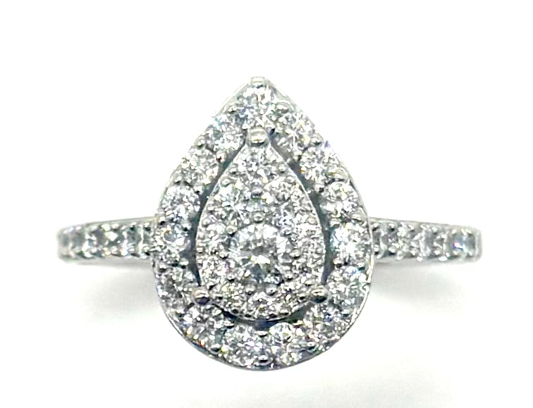 Diamond ring with a teardrop design on a white background