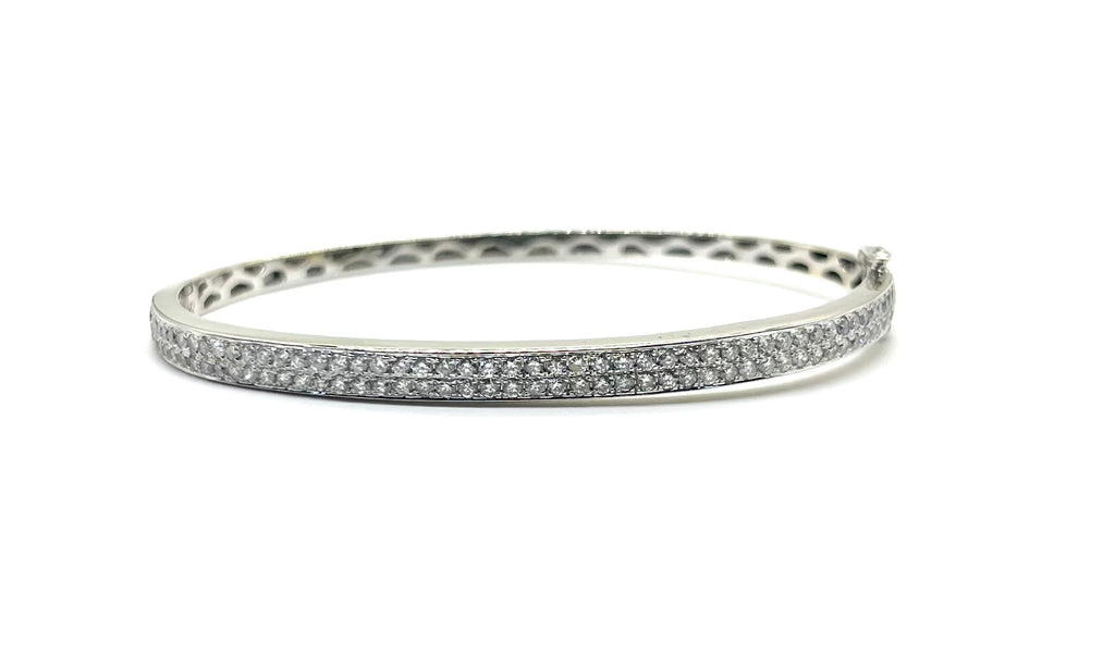 Silver bracelet with small stones on a white background