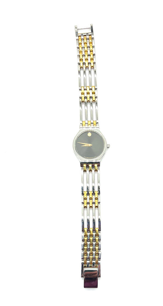 Two-tone watch with a silver and gold band on a white background