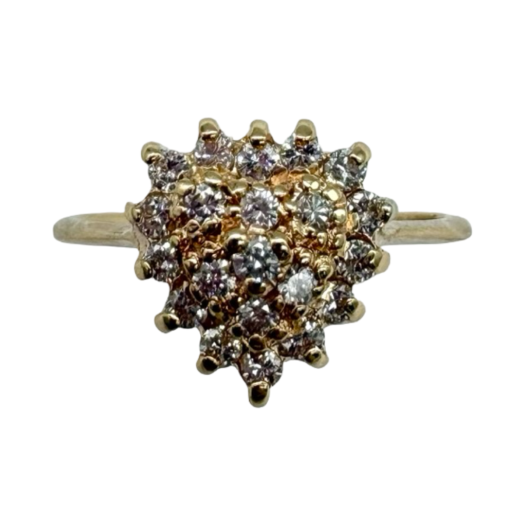 Gold and diamond ring on a white background