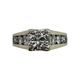 Silver ring with clear gemstones on a white background