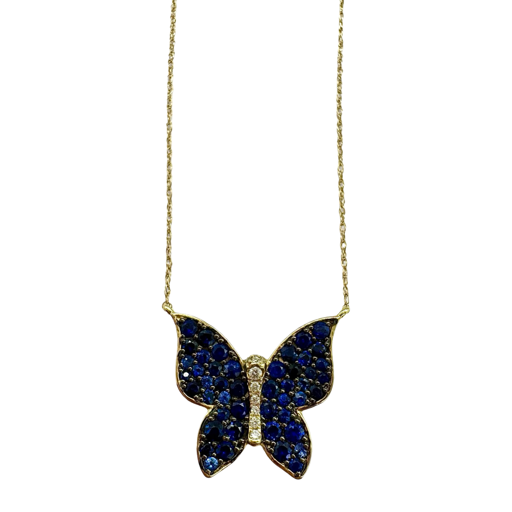 Butterfly-shaped necklace with blue stones on a white background
