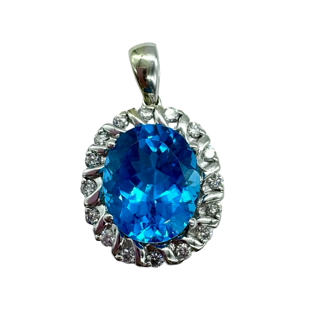 Silver pendant with a blue gemstone on a white background