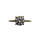 Gold ring with a large diamond on a white background