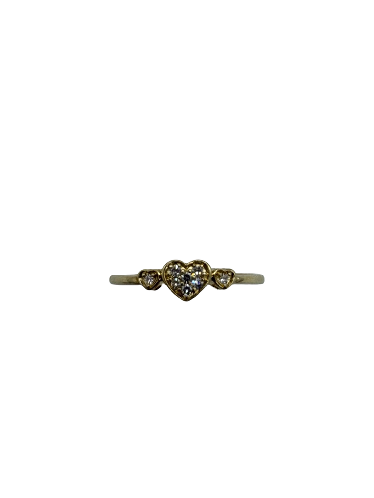 Heart-shaped ring with small diamonds on a white background