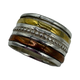 .925 Sterling Silver and Copper Multi Row Spinner Band Multicolored ring with metallic bands on a white background