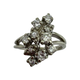 Vintage 14K White Gold 1/3CTW Diamond Cluster Split Bypass Ring Silver ring with diamond clusters on a white background