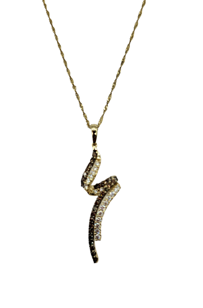 Gold necklace with a unique pendant on a white background