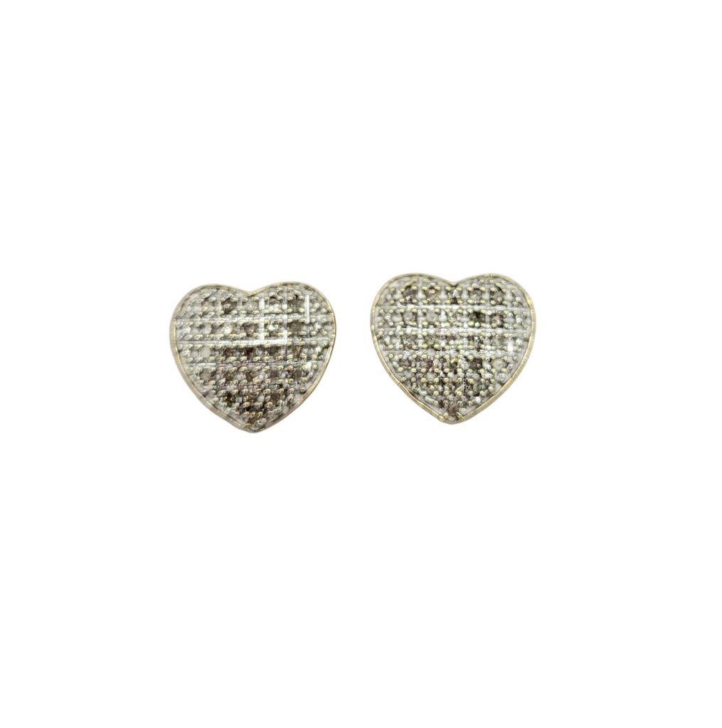Heart-shaped earrings with diamond-like stones on a white background
