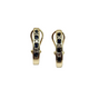 Gold earrings with embedded stones on a white background