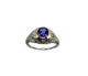 Silver ring with a blue gemstone on a white background
