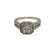 Diamond ring with a white gold band on a white background