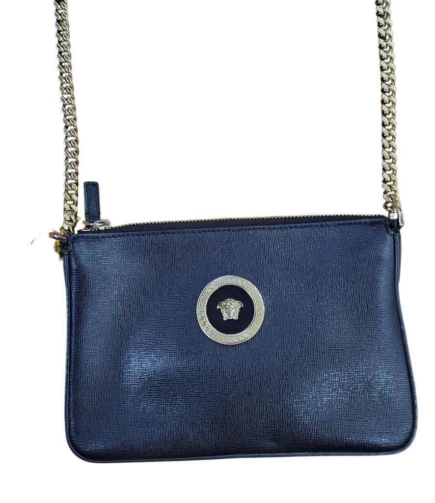 Blue handbag with a chain strap on a white background