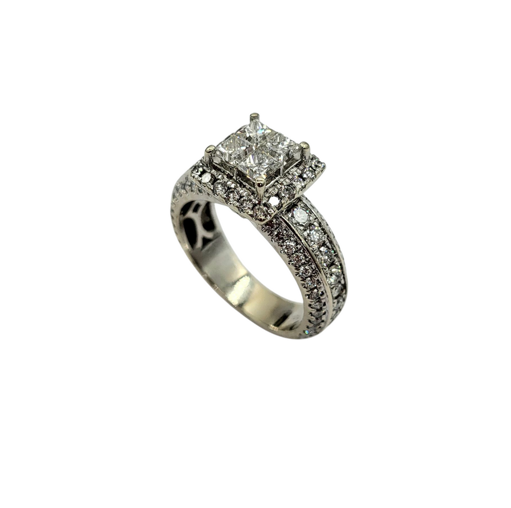 Diamond ring with a central stone and smaller stones on a white background