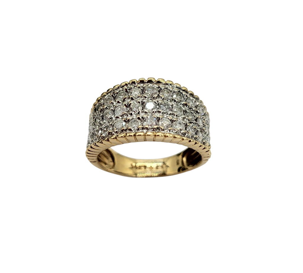Gold ring with diamond accents on a white background