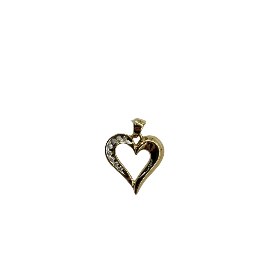Heart-shaped gold pendant with embedded stones on a white background