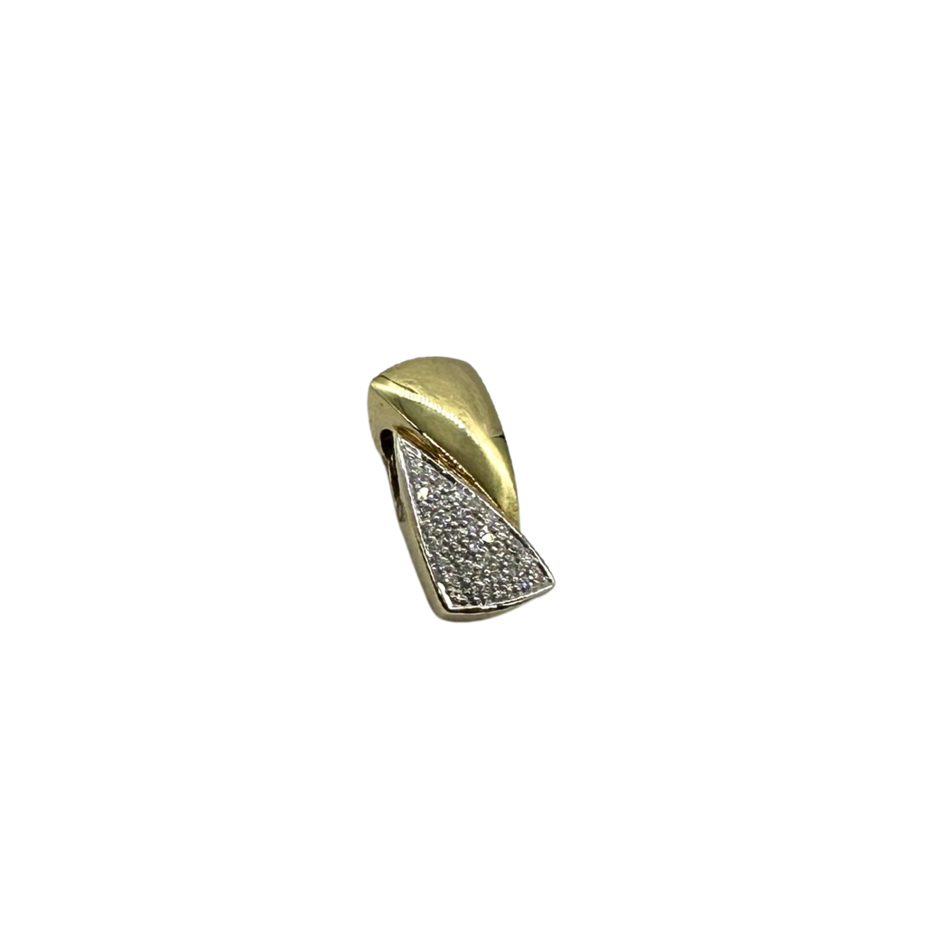 Gold and diamond-encrusted pendant on a white background