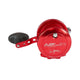 Red fishing reel with black handle on a white background