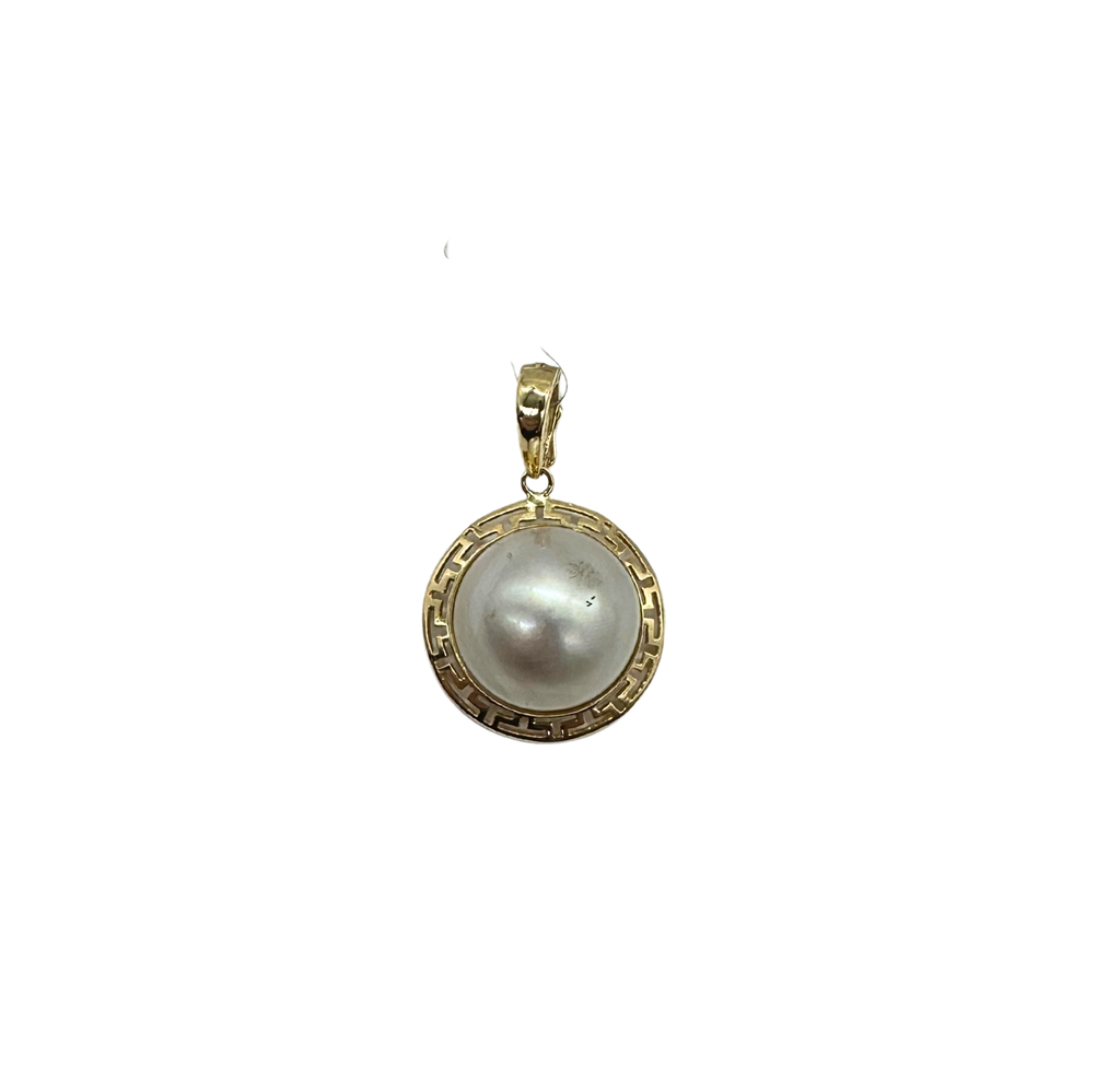 Gold pendant with a pearl on a white background