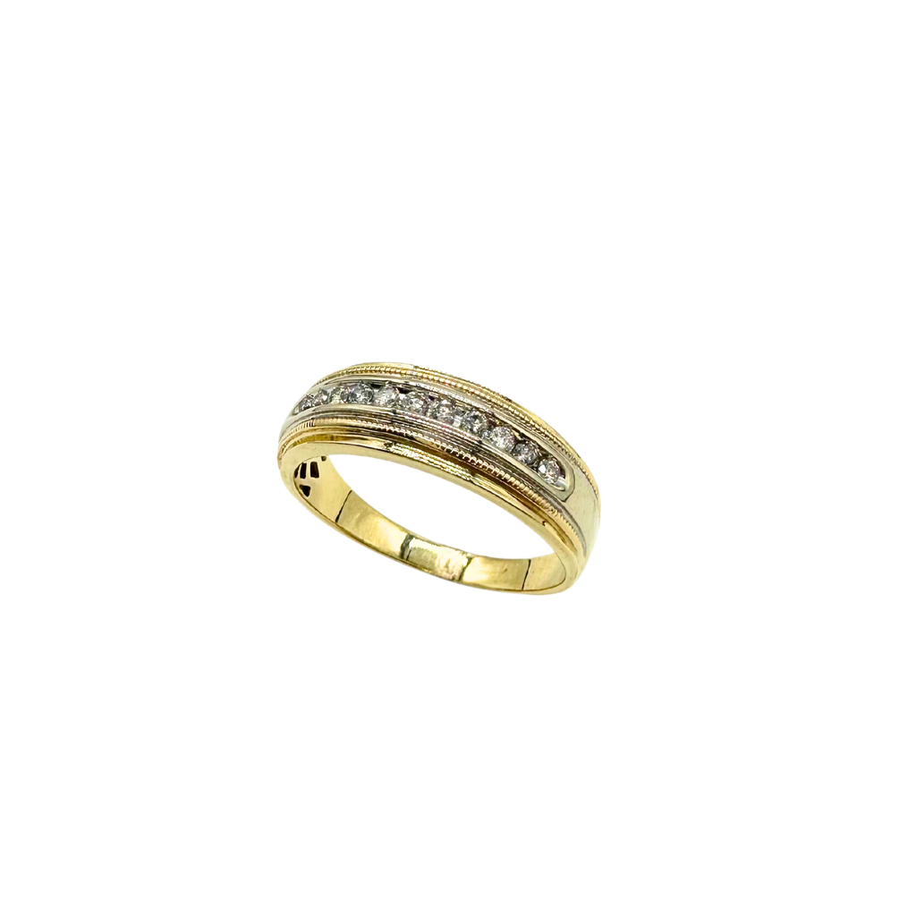 Gold ring with embedded diamonds on a white background