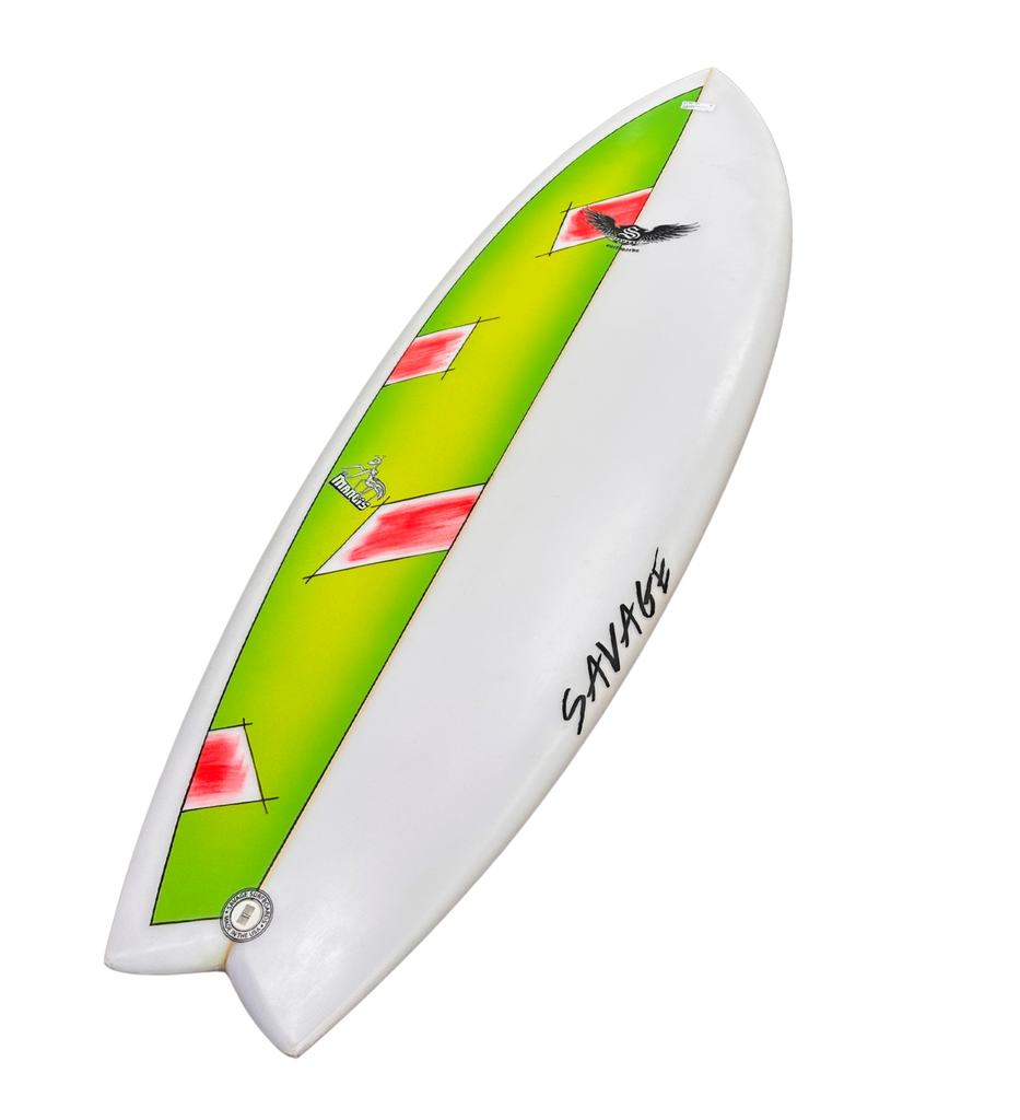 Surfboard with green and white design on a white background