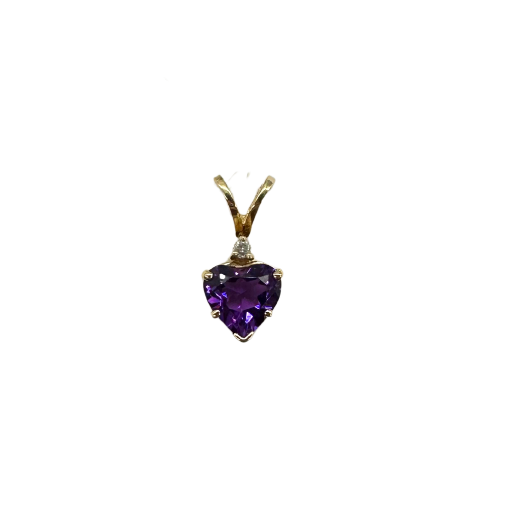 Heart-shaped purple gemstone pendant on a white background