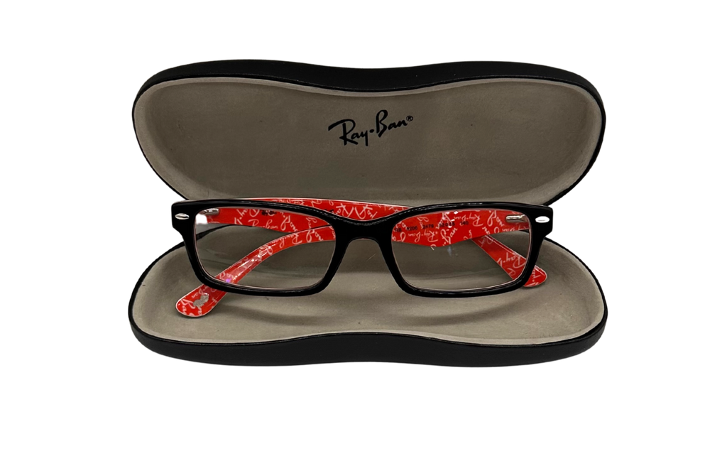 Red and black eyeglasses in a Ray-Ban case on a white background