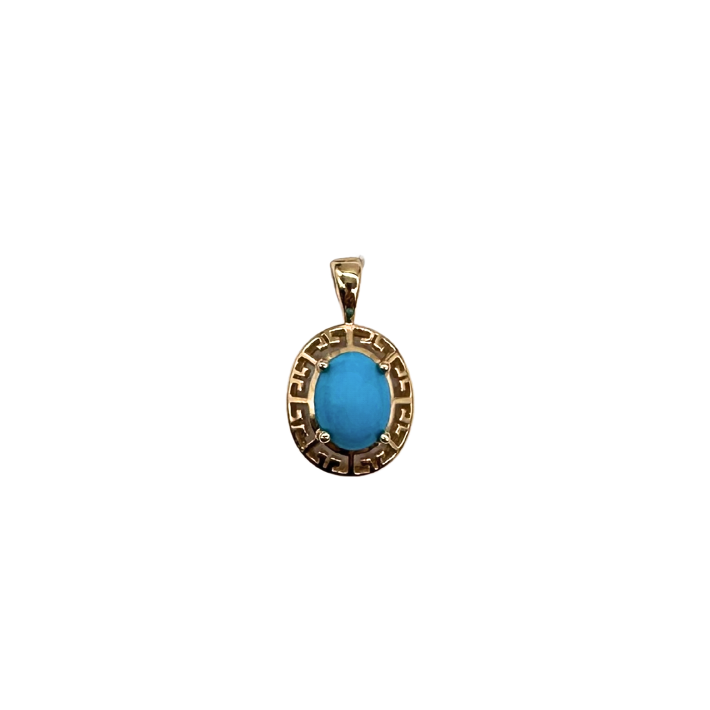 Gold pendant with a blue stone on a white background
