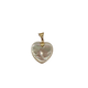 Heart-shaped pearl pendant with gold chain on a white background