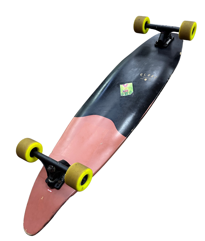 Longboard with black and pink design on a white background