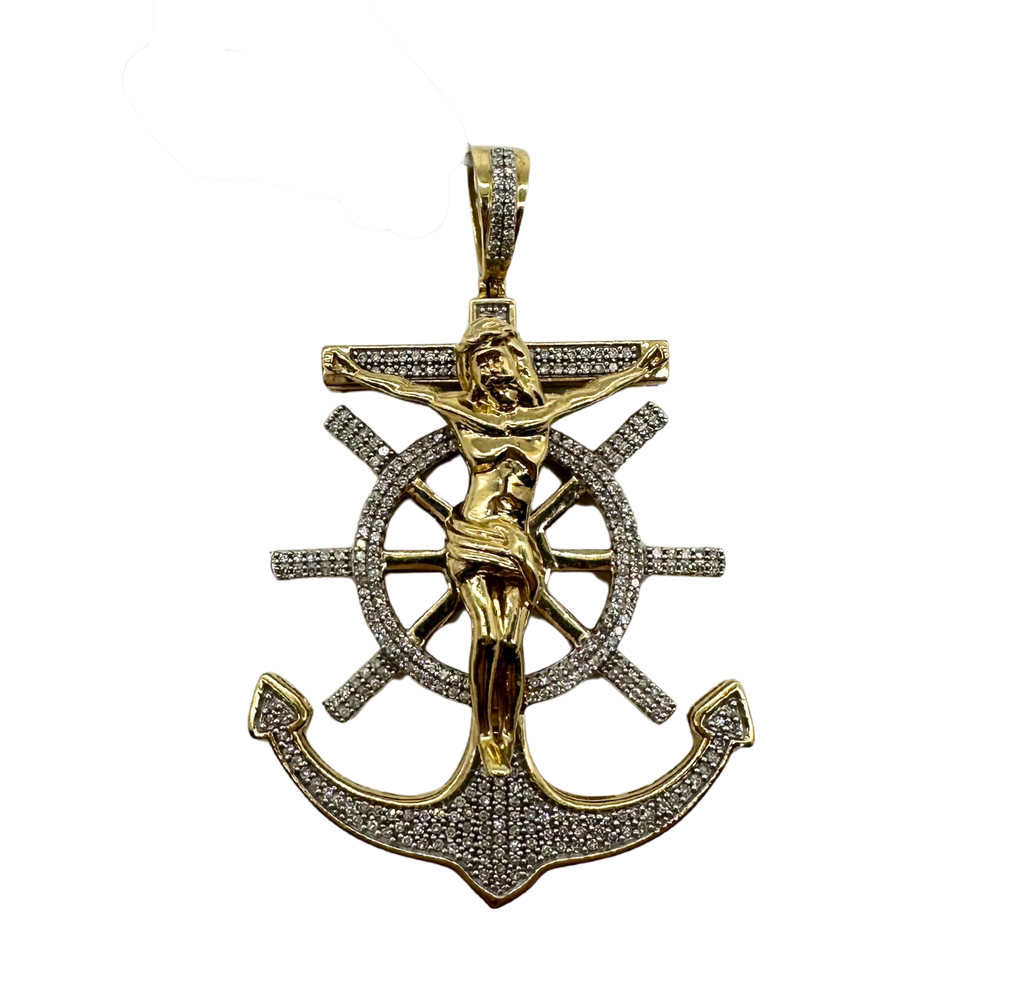 Gold and silver anchor pendant with a ship's wheel and crucifixion scene on a white background
