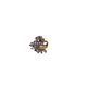 Gold ring with star-shaped gemstones on a white background