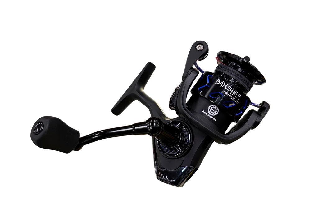 Black fishing reel with visible branding on a white background