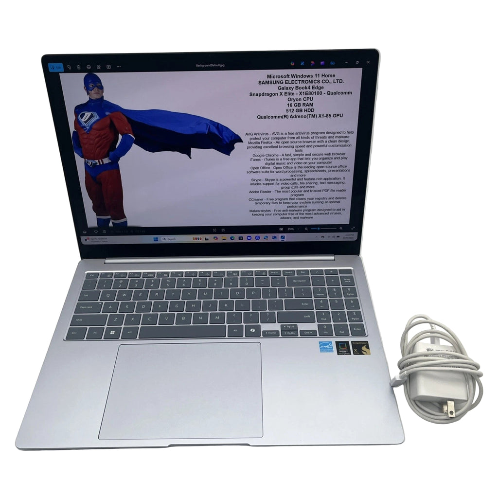 Laptop with superhero costume on screen and power cable on white background