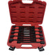 Set of black tools in a red tool case on a white background