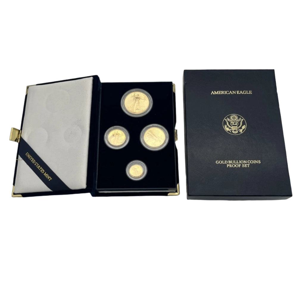 Gold bullion coins in an 'American Eagle' box on a white background