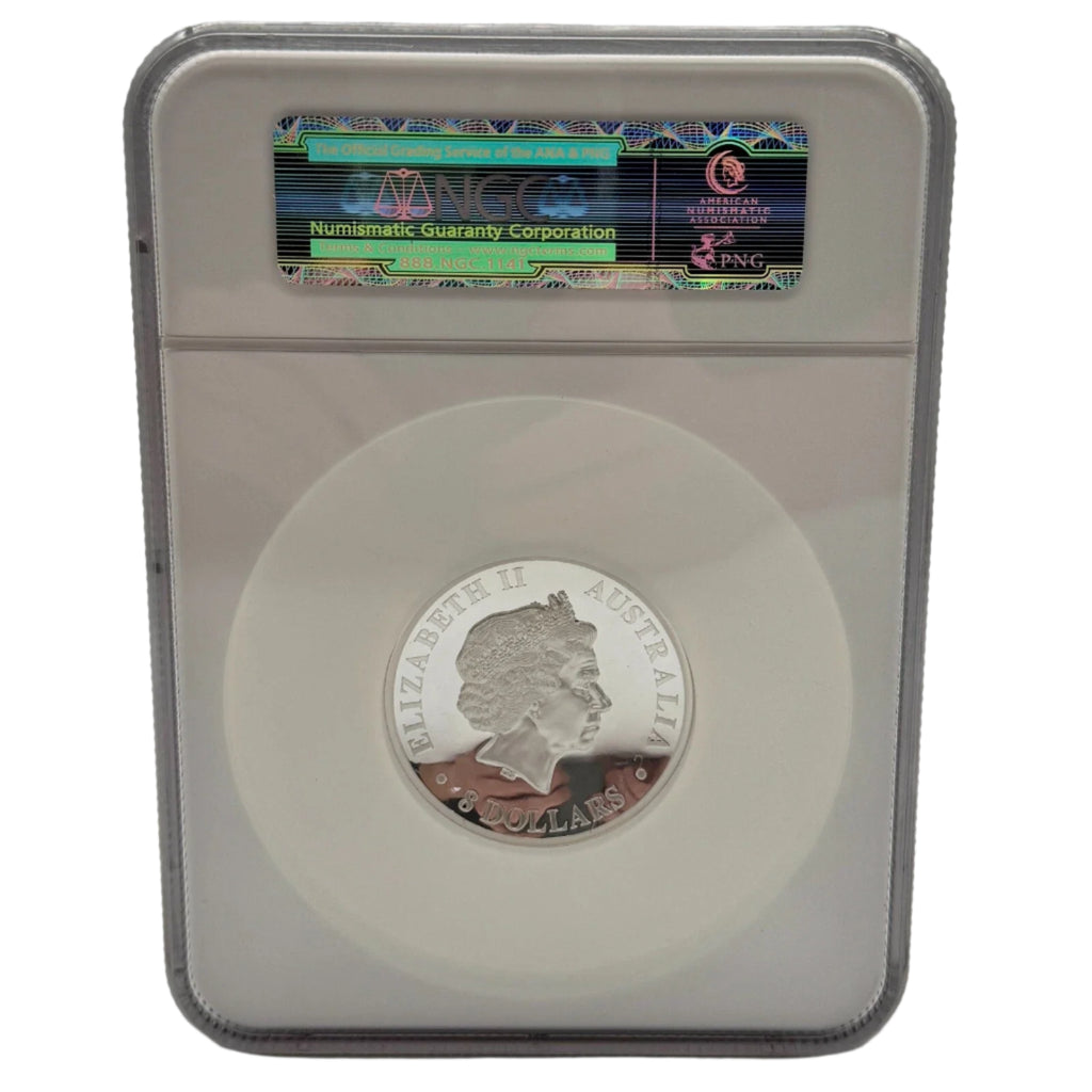 Silver coin in a protective case with Numismatic Guaranty Corporation (NGC) label on a gray background