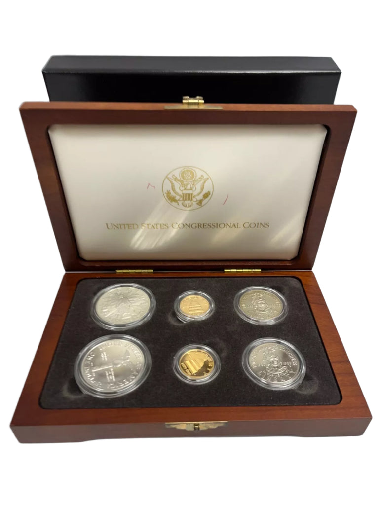 Set of coins in a wooden display case with a visible U.S. Congressional Coins logo.