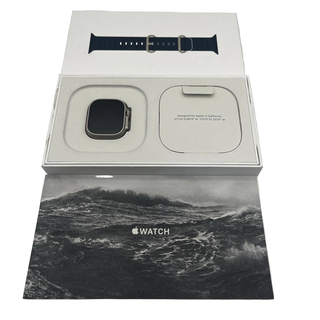 Apple Watch box with watch and strap on a white background